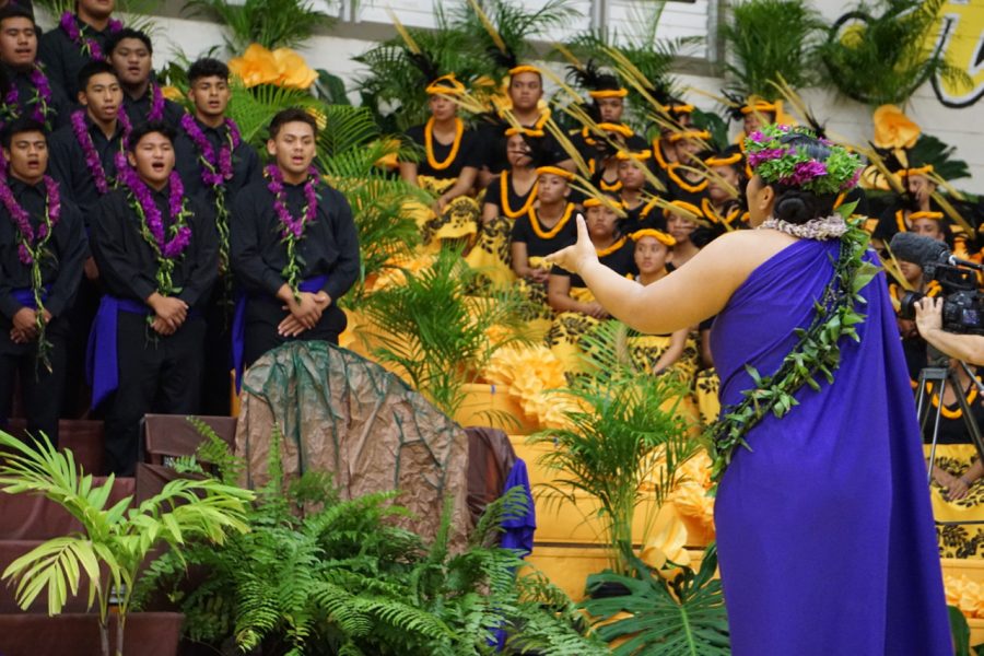 Lahela Kaeo, the Junior Class Songleader, conducts her class in the 28th annual NHIS Songfest.