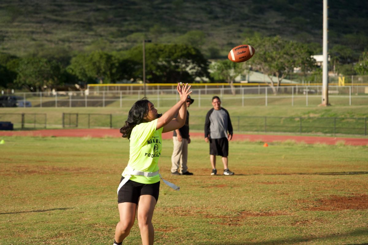 Nikki-Marie Salausa (9) catches a pass at practice in preparation for the upcoming Girls Flag Football Season that starts on March 25, 2025.