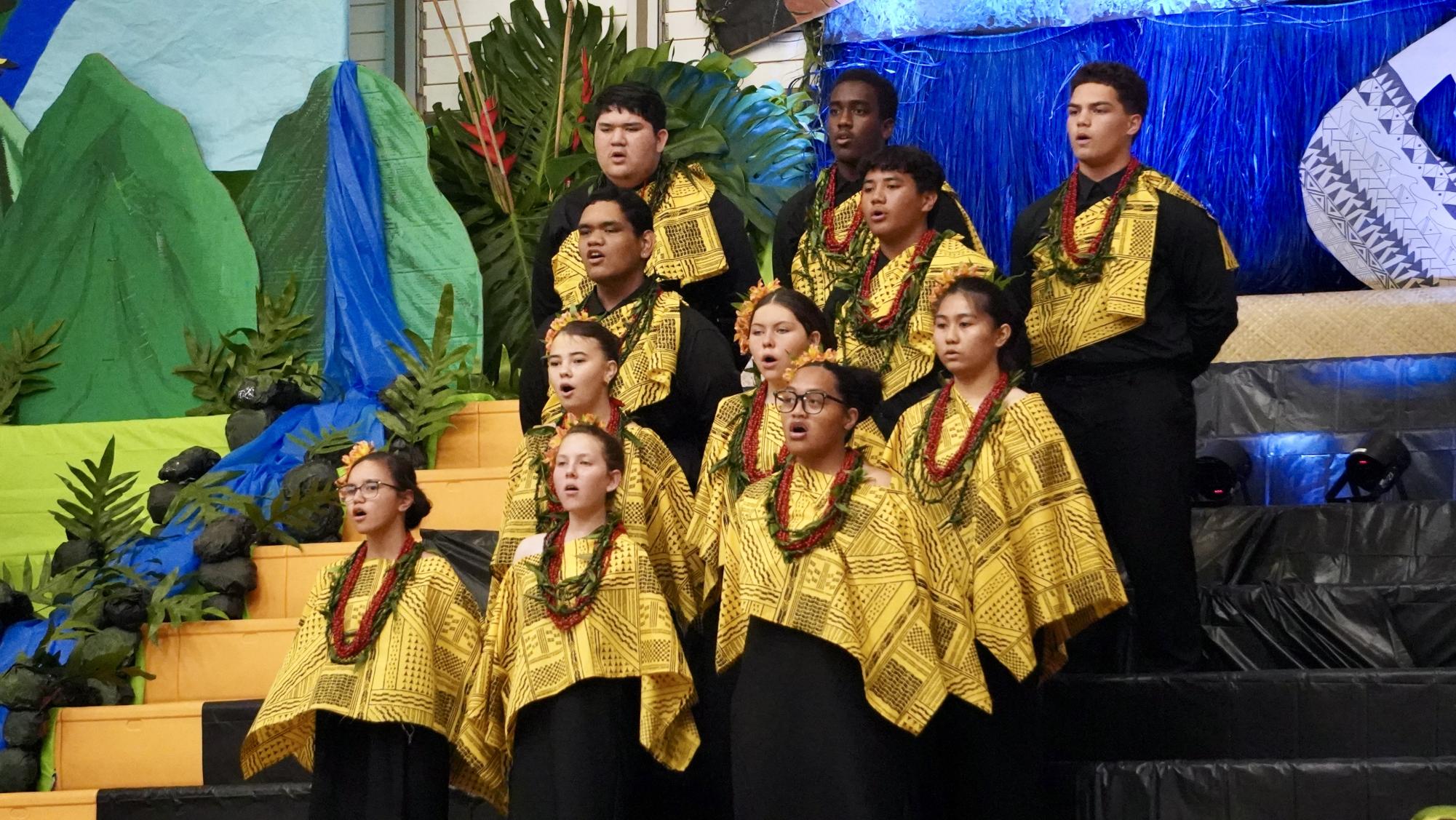 Caption: The Class of 2029 had the least amount of participants with 11 students singing, lead by their Song Leader Evelyn Soumwei. Their voices still rung loudly through the stands of the gym.